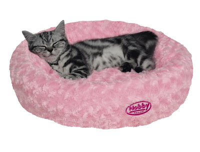 Cat lying on a pink Nobby pet bed with a white background