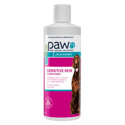 Bottle of Paw Sensitive Skin Conditioner for dogs on a white background