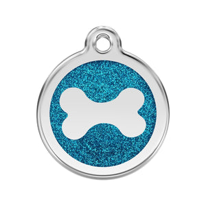 Dog tag with blue glittery background and white bone symbol on a white background