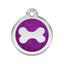 Pet tag with purple glittery background and white bone symbol on a white background