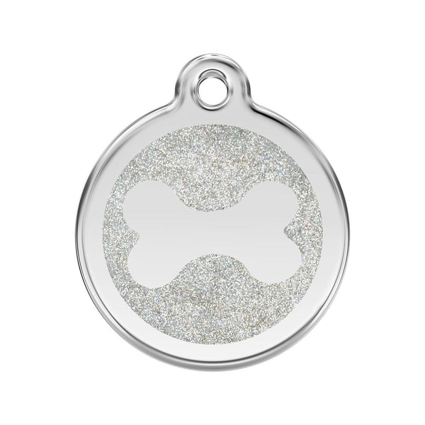 Silver pendant with a circular design on a white background