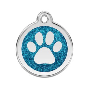 Pet tag with blue glitter background and white paw print on a white background