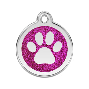 Pet tag with pink glittery paw print design on a white background