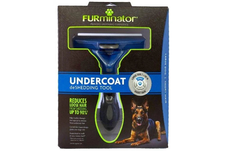 Furminator dog grooming tool packaging on a white background