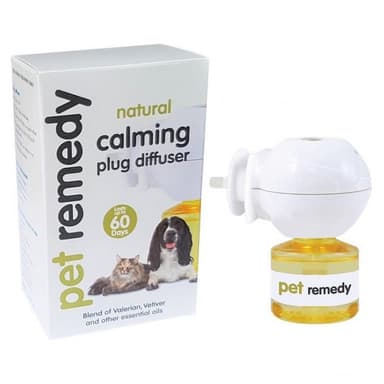 Pet remedy natural calming essential oil refill bottles and packaging box, featuring two amber glass bottles with white dropper caps and a white box with images of a dog and cat.