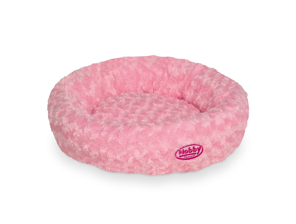 Pink donut-shaped pet bed with a visible brand logo on a white background