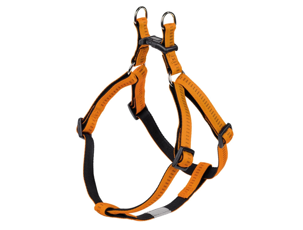 Orange and black dog harness on a white background