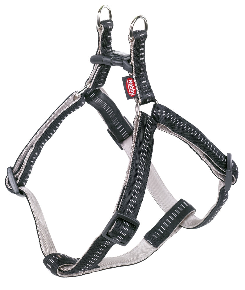 Dog harness with black and gray pattern on a white background