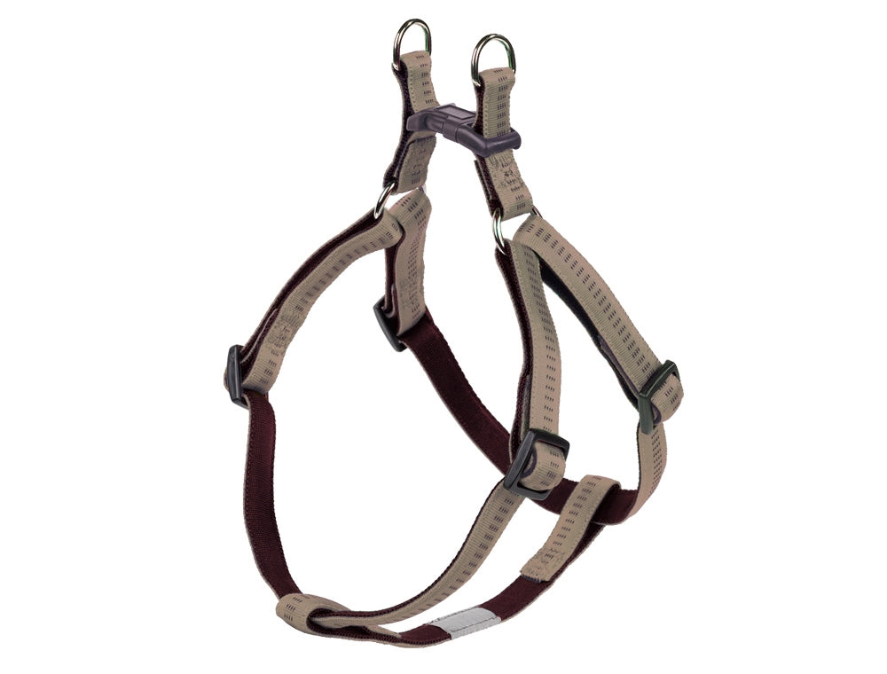 Dog harness with brown and beige straps on a white background