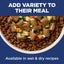Dog food with added variety of pieces on a blue background