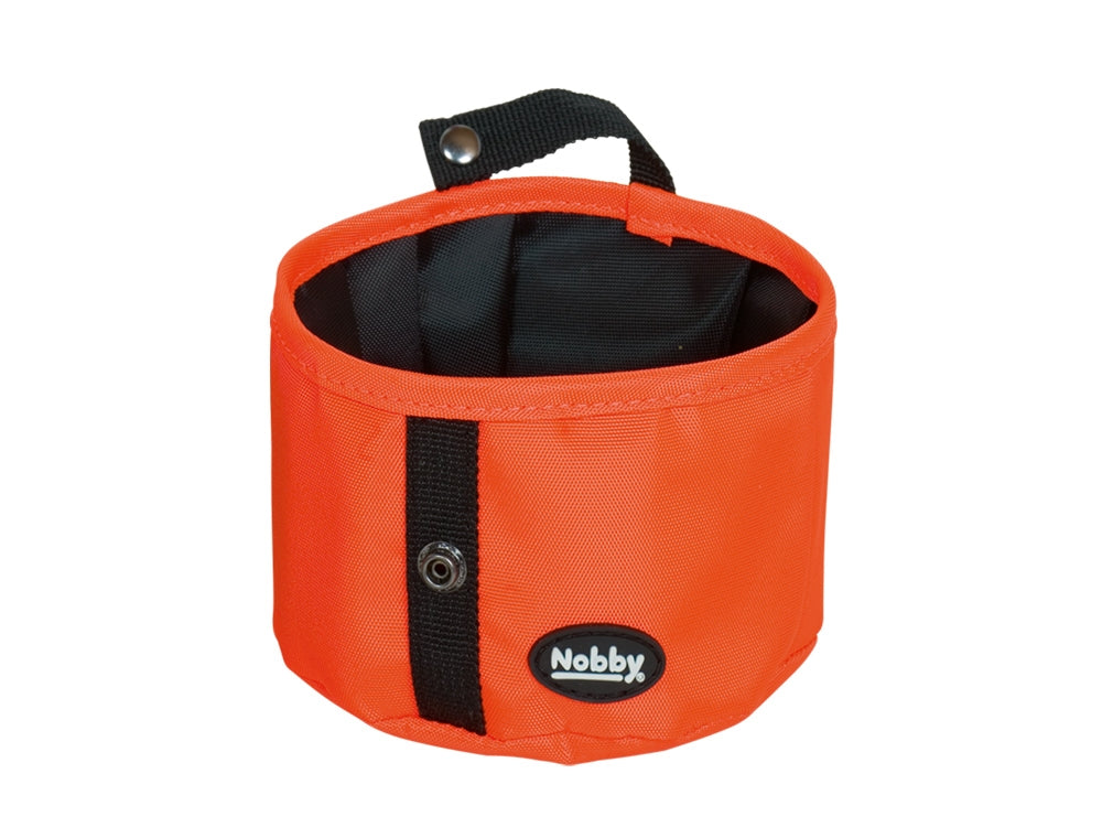 Orange dog bowl with black handle and Nobby logo on a white background