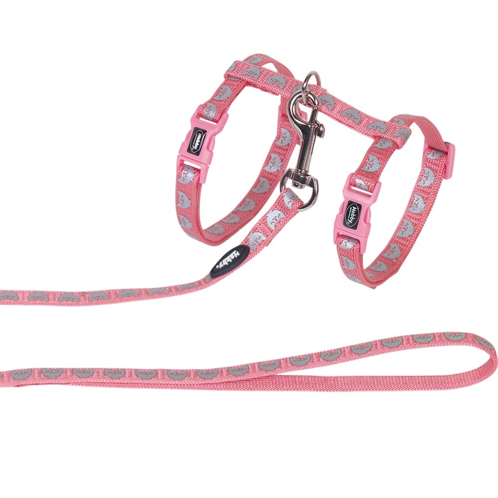 Pink dog harness and leash with gray pattern on a white background