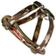 Camouflage dog harness with a visible brand label on a white background