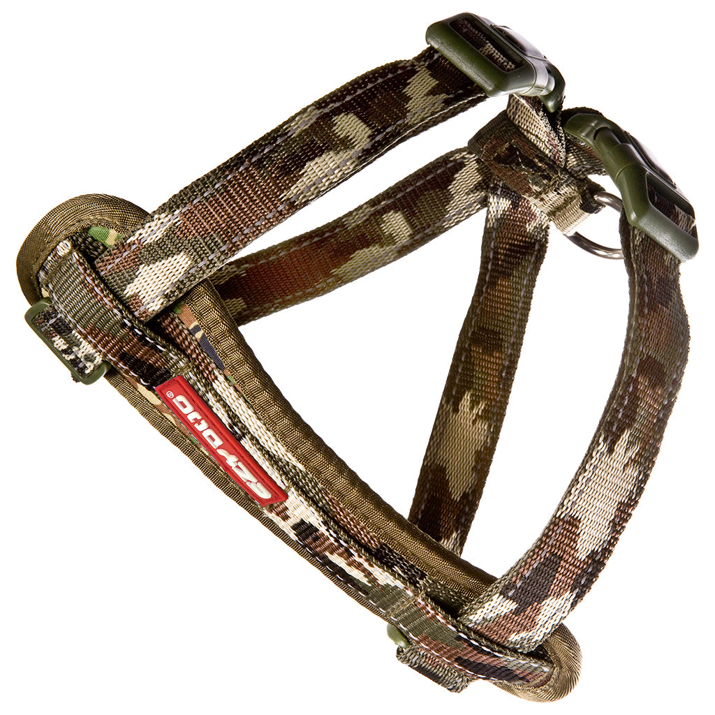 Camouflage dog harness with a visible brand label on a white background