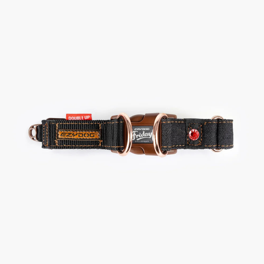 Dog collar with leather accents and brand labels on a white background