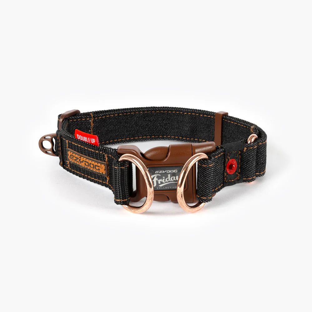 Dog collar with black strap, brown leather accents, and visible brand logo on a white background