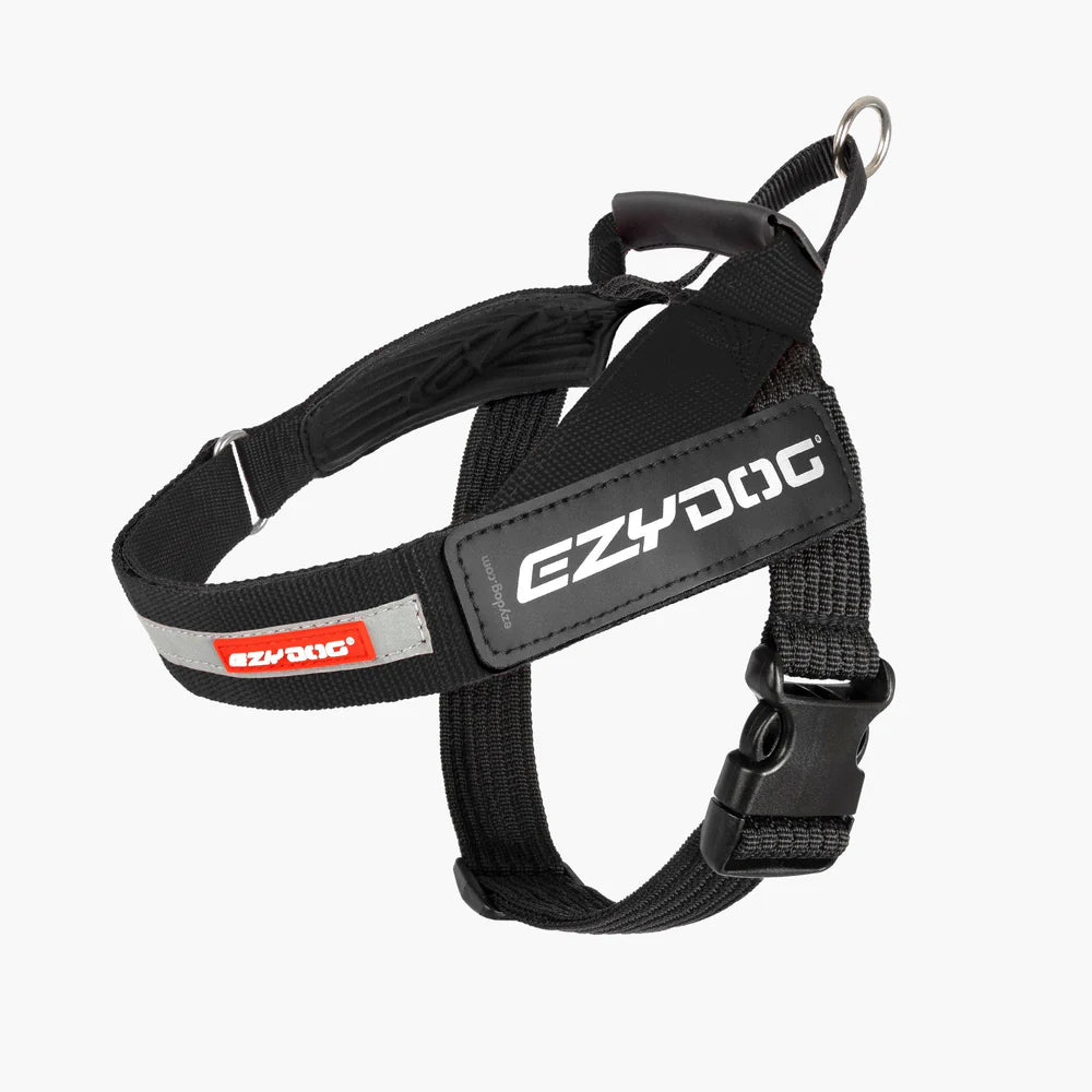 Black dog harness with EzyDog branding on a white background