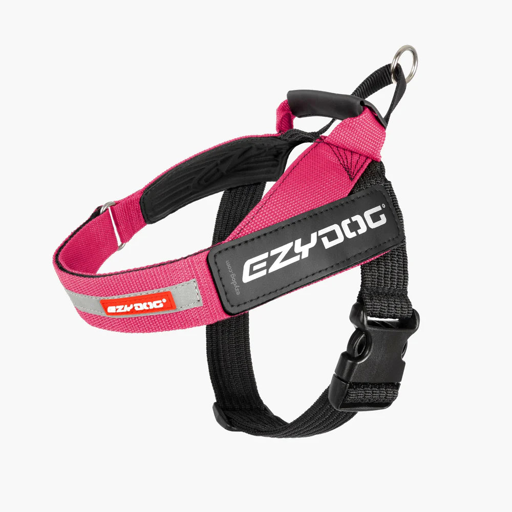 Pink dog harness with EzyDog branding on a white background