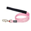Pink dog leash with black handle and metal clip on a white background