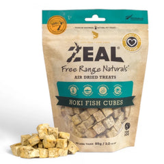 A bag of Zeal Free Range Naturals Hoki Fish Cubes air dried pet treats, shown with several cubes piled in front on a white background.