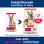 Two packages of Hill's Science Diet dog food with a blue banner and text about breakthrough nutrition and activbiome technology.
