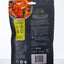 Back view of a black pet food packaging with salmon chunks and branding details.