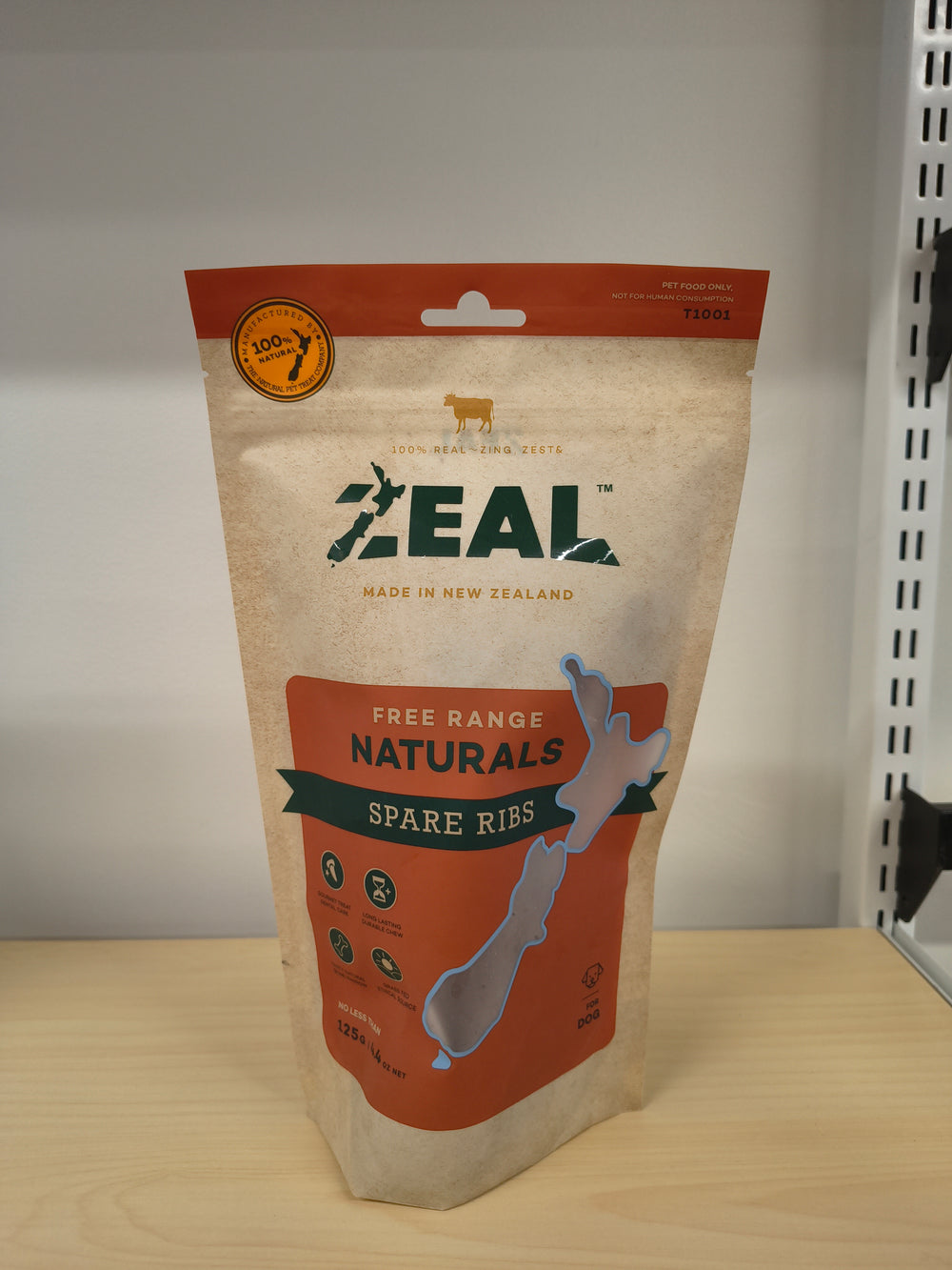 ZEAL free range natural spare ribs packaging with a bone on a white background