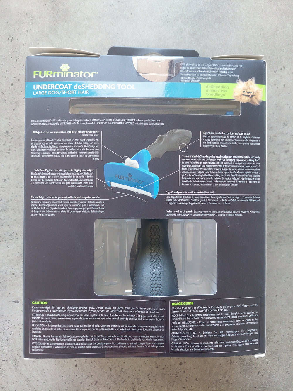 FURminator undercoat shedding tool packaging on a concrete floor